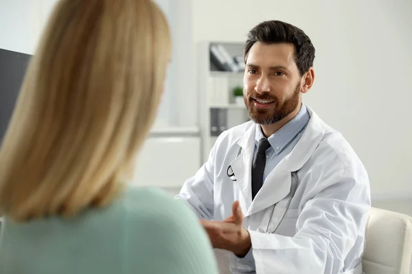 Doctor speaking with a patient